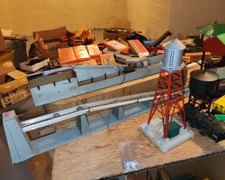 Lionel trains, transformers, buildings, structures, track and even empty boxes