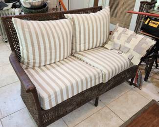 matching wicker sofa , loveseat & table.  In sunroom