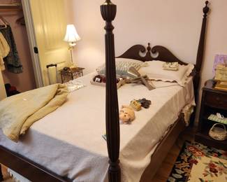 bedroom 3: 4 poster bed, 1 tall dresser and 1 night stand