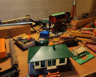 Lionel trains, transformers, buildings, structures, track and even empty boxes