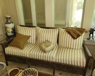 matching wicker sofa , loveseat & table.  In sunroom