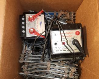 Lionel trains, transformers, buildings, structures, track and even empty boxes