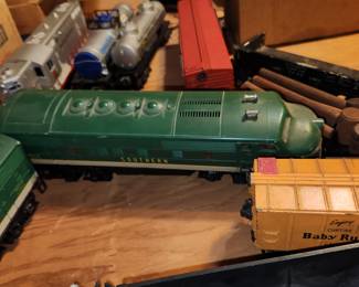 Lionel trains, transformers, buildings, structures, track and even empty boxes