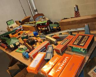 Lionel trains, transformers, buildings, structures, track and even empty boxes