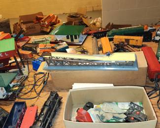 Lionel trains, transformers, buildings, structures, track and even empty boxes