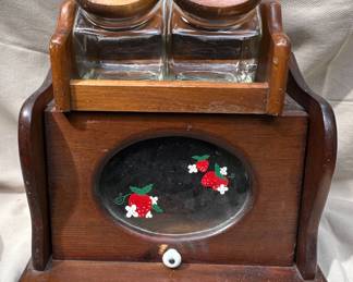 Vintage bread box and lidded canisters.