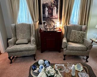 Lots of beautiful items including the Thomasville dry sink sitting between the wingback chairs.
