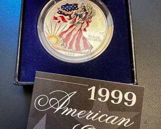 Colorized 1999 American Eagle silver dollar.