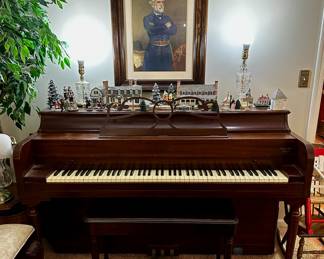 Robert E Lee watches over the Williamsburg village that sits upon the vintage Lester upright piano with bench.