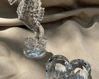 Waterford crystal seahorse and heart paperweights.