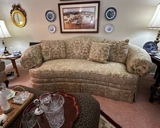 Lots of beautiful items including signed and numbered prints from Jack DeLoney.  Curved sofa is made in USA from Sherrill.