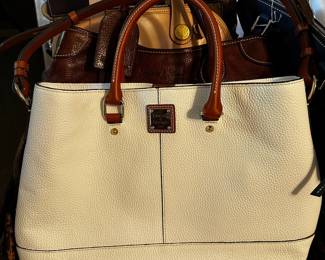 Lots of handbags and purses.  Dooney & Bourke, Brighton, Coach and Vera Bradley are among the featured.