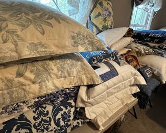 Lots of pillows and linens.