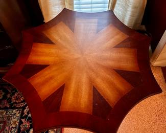 Top of clawed foot inlaid pedestal side table.