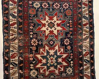Persian style rug 56 x 44” (on the wall in back right room)
