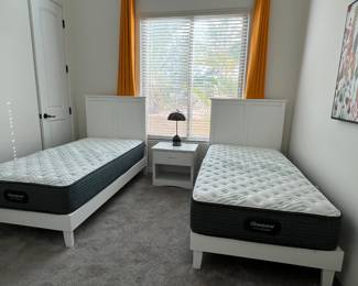 Twin Beds, Nightstand, Table Lamp, Twin Mattresses, Orange Drapes