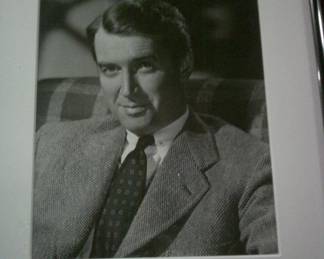 Several framed Hollywood pictures