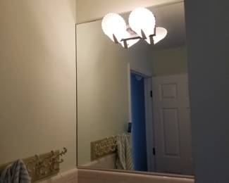Mirror; vanity light