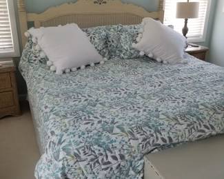 King size bed with wicker headboard matches armoire