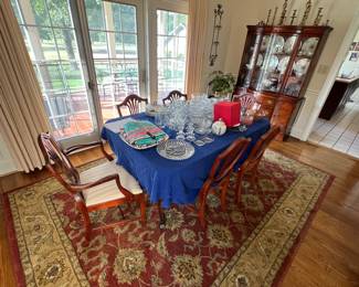 Dining table 
Crystal glass 
China large area rug 