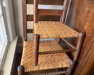Antique child’s chair and matching adult 