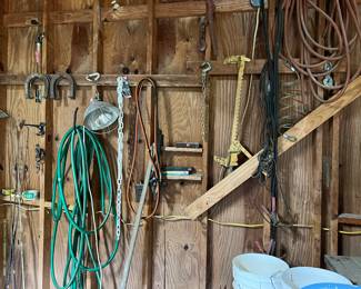 Assorted tools, hoses, shop lights, buckets and more. 