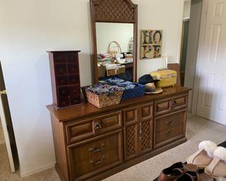 Vintage dresser. There is a headboard that matches the dresser