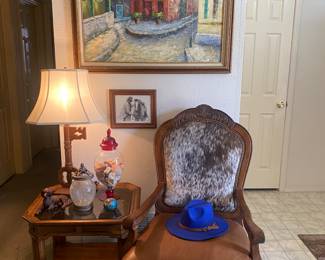 Very nice animal hide chair. Wonderful statement piece!