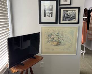 Antique side table, TV, photographs