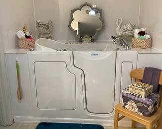 SAFE STEP WALK IN BATHRUB WITH LOW STEP IN, ANTI SLIP SEAT AND BOTTOM HYDRO MASSAGE JETS HEARING SEAT AND BACK