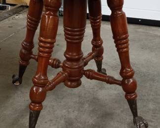 Old glass ball foot piano stool.