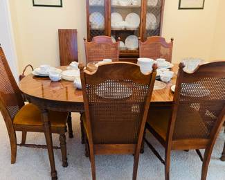 Beautiful Mid Century Dining Table with (6) Matching High Back Cane Chairs, also Matching China Cabinet 