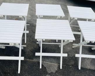 Several White Wooden Fold Out Tables 
