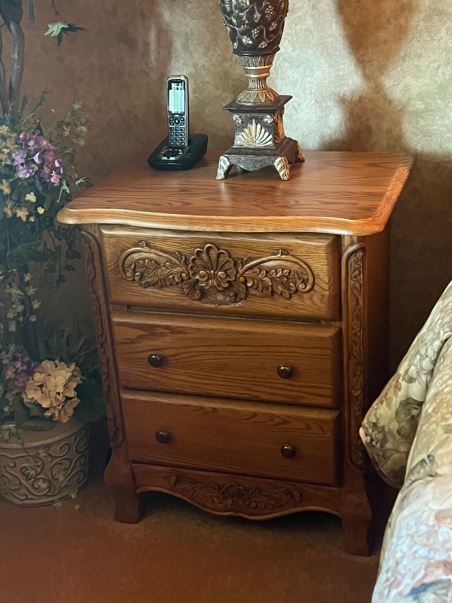There is a pair of matching nightstands in this bedroom set.