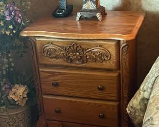 There is a pair of matching nightstands in this bedroom set.