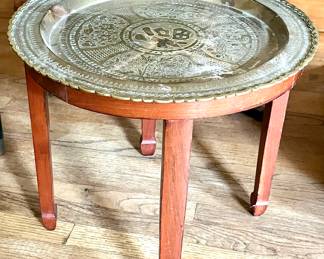 Low round metal top table