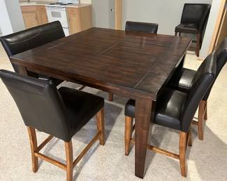 Table has foldout leaves. 