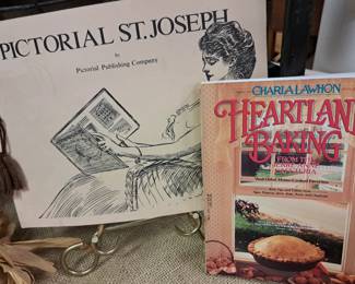 Much St. Joseph collectibles. "Heartland Baking  From the Jerre Anne Cafeteria" cookbook by Charla Lawhon and "Pictorial St. Joseph"