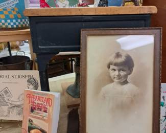 Much framed artwork and photos.