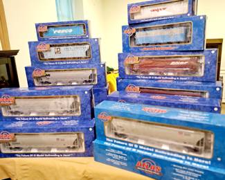Large selection of vintage and modern toys. "Atlas" railroad cars new in boxes