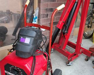 Large selection of tools and related items. Lincoln welder and engine hoist/stand