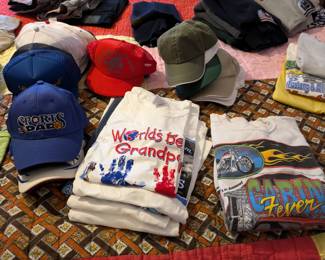 Lots of T-shirts & hats