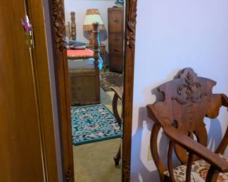 Wall jewelry armoire with mirrored door