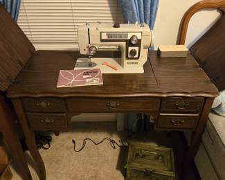 New Home - Model 551 in cabinet with drawers