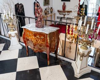 Pair of bronze-mounted marble pedestals, electric urn-form candelabra