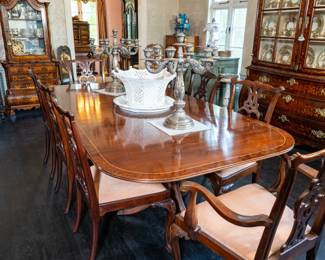 Banded mahogany table and twelve antique mahogany Irish Chippendale chairs