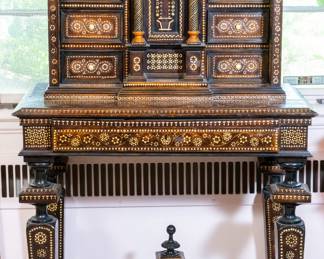 An Italian 19th-century walnut, ebonized, fruitwood and bone 'alla certosina' inlaid cabinet on stand