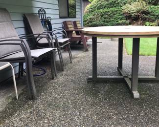 Round Steel Outdoor Dining Table, Assortment of Patio Chairs