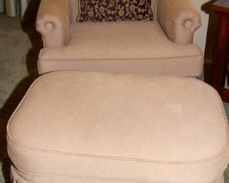 Upholstered beige chair and matching ottoman