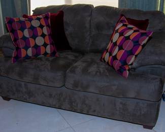 Plush upholstered loveseat